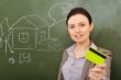 Closeup portrait of pretty young business woman against green bo