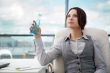 Beautiful business woman thinking about"magenta"> some</spa