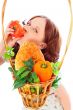 Closeup portrait of young pretty woman with basket of autumn har