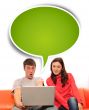 Portrait of a young couple using a computer.