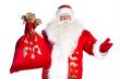 Santa Claus standing up on white background with his bag full of