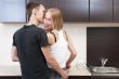Portrait of a cute young couple enjoying themselves while prepar
