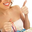 Portrait of lovely woman with shopping bags over white