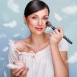Portrait of a Beautiful woman applying mak<sp