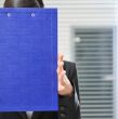 A portrait of a young business woman in an of