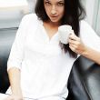 Portrait of a beautiful young woman working o