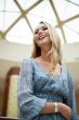 Portrait of young beautiful woman indoors