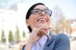 Closeup portrait of cute young business woman smiling