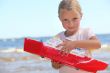 Girl playing with boat