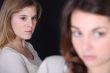 Woman looking at another