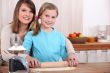 mother and daughter cooking together