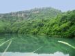 Small lake between the caucasus mountains summertime