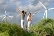 Couple stood in wind farm