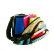 Backpack with colorful books and tablet PC against white backgro