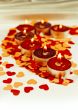 Burning candles heart shaped