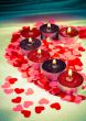 Burning candles heart shaped 