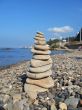 Balanced stones on the seashore
