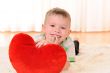 child with a plush heart