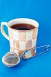 Cup of tea and tea infuser