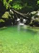 Waterfall between the rocks. The Caucasus nature