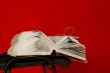 Open book laying on the chair 