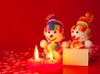 Three snowmen with two burning heart shaped candles