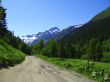 Road leads close to the snowy mountain