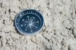 Compass in the sand