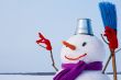 Lonely snowman at a snowy field