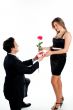 man gives a woman flowers