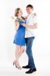 man gives a woman flowers