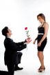 man gives a woman flowers