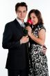 man gives a woman flowers