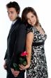 man gives a woman flowers