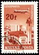 Flying plane above the Helsinki on post stamp