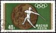 Javelin throwin and Olympic medal on post stamp