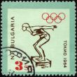 Jumping swimmer on post stamp