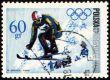 Ski jumper on post stamp