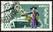 Passenger ship and man in national Mongolian costume on post stamp