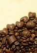 Heart shaped chocolate candies and coffee beans