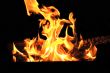Red flame on the black background