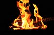 Red flame on the black background