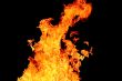 Red flame on the black background