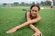 attractive young woman and football player