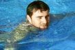 young man in water