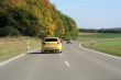 silver and yellow car driving on the road