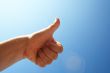 show positive signs with hand-