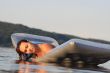 woman lying air mattress