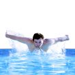 man swims using the butterfly 