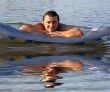 man air mattress in the lake